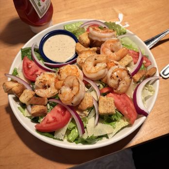 The New American Grill - Grilled shrimp Caesar salad dressing in the side - Burgers Near Me - Londonderry, Vermont The New American Grill - Grilled shrimp Caesar salad dressing in the side - Burgers Near Me - Londonderry, Vermont