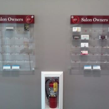 Sola Salon Studios - Business cards of some of the stylists here - Hair Salons Near Me - Fullerton, California
