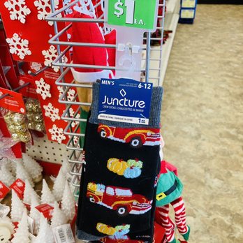 Dollar Tree - Dollar Tree - Children's crew socks featuring a red car design are displayed on a metal rack, priced at $1 each, in a store aisle. - Discount Store Near Me - Easton, Pennsylvania