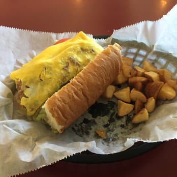 Windy Corner Market - Browning's Country Ham Po-boy with potatoes. - American Near Me - Lexington, Kentucky Windy Corner Market - Browning's Country Ham Po-boy with potatoes. - American Near Me - Lexington, Kentucky