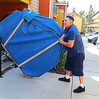 Priority Piano Movers - After going down 2 flights of stairs, my team member is about to our piano moving dolly - Piano Services Near Me - Anaheim, California