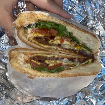 Deli Delights - Bacon Egg and cheese on a roll with some extra toppings - Delis Near Me - New Britain, Connecticut Deli Delights - Bacon Egg and cheese on a roll with some extra toppings - Delis Near Me - New Britain, Connecticut
