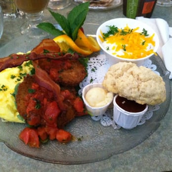 Wildflower Cafe - The Southern Sunday (or Sundae?). Either way, my wife loved it...fried green tomatoes, cheese grits, bacon, omelette & biscuits. - Breakfast & Brunch Near Me - Clearwater, Florida Wildflower Cafe - The Southern Sunday (or Sundae?). Either way, my wife loved it...fried green tomatoes, cheese grits, bacon, omelette & biscuits. - Breakfast & Brunch Near Me - Clearwater, Florida