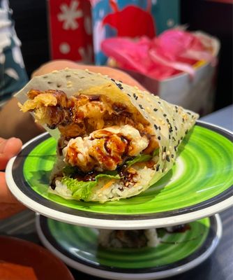 Kura Revolving Sushi Bar by null