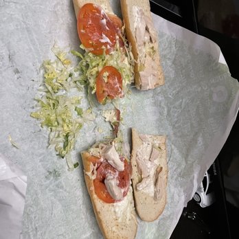 QuickChek - a cut in half sandwich with lettuce and tomato - Convenience Stores Near Me - South Plainfield, New Jersey