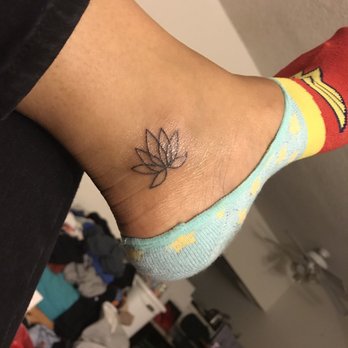 Beyond Kreations Tattoo - My Lotus flower, done by Lily! Very simple and elegant. I love the placing so much - Tattoo Near Me - Fullerton, California Beyond Kreations Tattoo - My Lotus flower, done by Lily! Very simple and elegant. I love the placing so much - Tattoo Near Me - Fullerton, California