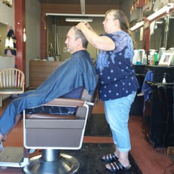 Sportsman's Den Barber & Style Shop - Celeste the owner cut his hair,  turned out fine just for blowin in.