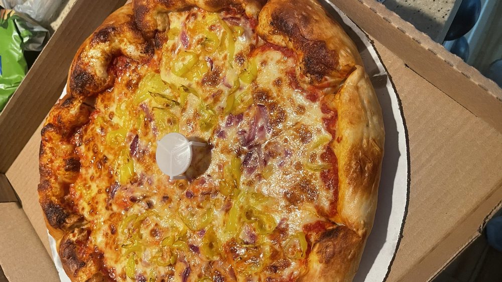 Village Market Pizza Logo