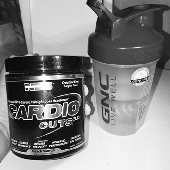 GNC - a black and white photo of a cup and a shaker - Vitamins & Supplements Near Me - Downey, California GNC - a black and white photo of a cup and a shaker - Vitamins & Supplements Near Me - Downey, California