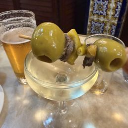 A Caña ( draft beer) , their Cava, and a Gilda. A Caña ( draft beer) , their Cava, and a Gilda.