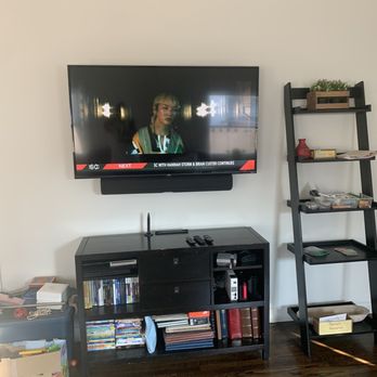 HD Custom Installations - Living room with 60" TCL with 3 gaming units, Firestick, soundbar with sanos undermounts to Tv, and HD antenna. - Home Theatre Installation Near Me - Buena Park, California HD Custom Installations - Living room with 60" TCL with 3 gaming units, Firestick, soundbar with sanos undermounts to Tv, and HD antenna. - Home Theatre Installation Near Me - Buena Park, California