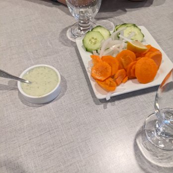 Aga's Restaurant & Catering - Complimentary cucumber and carrot slices with sauce - Pakistani Near Me - Houston, Texas