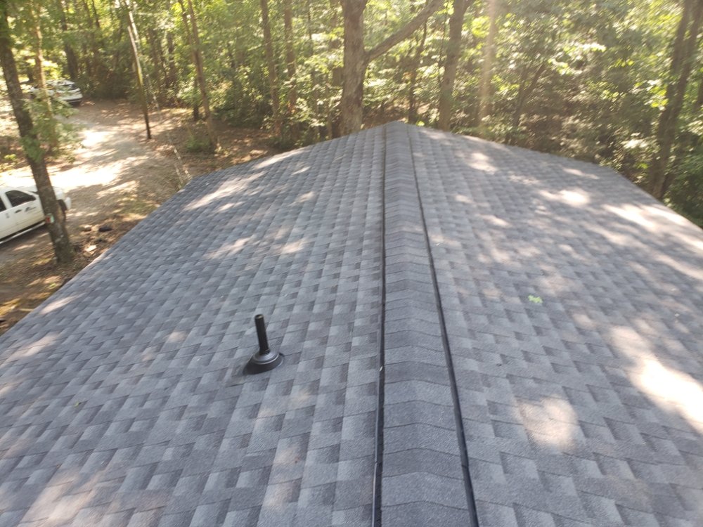 Slide of Real Deal Roofing