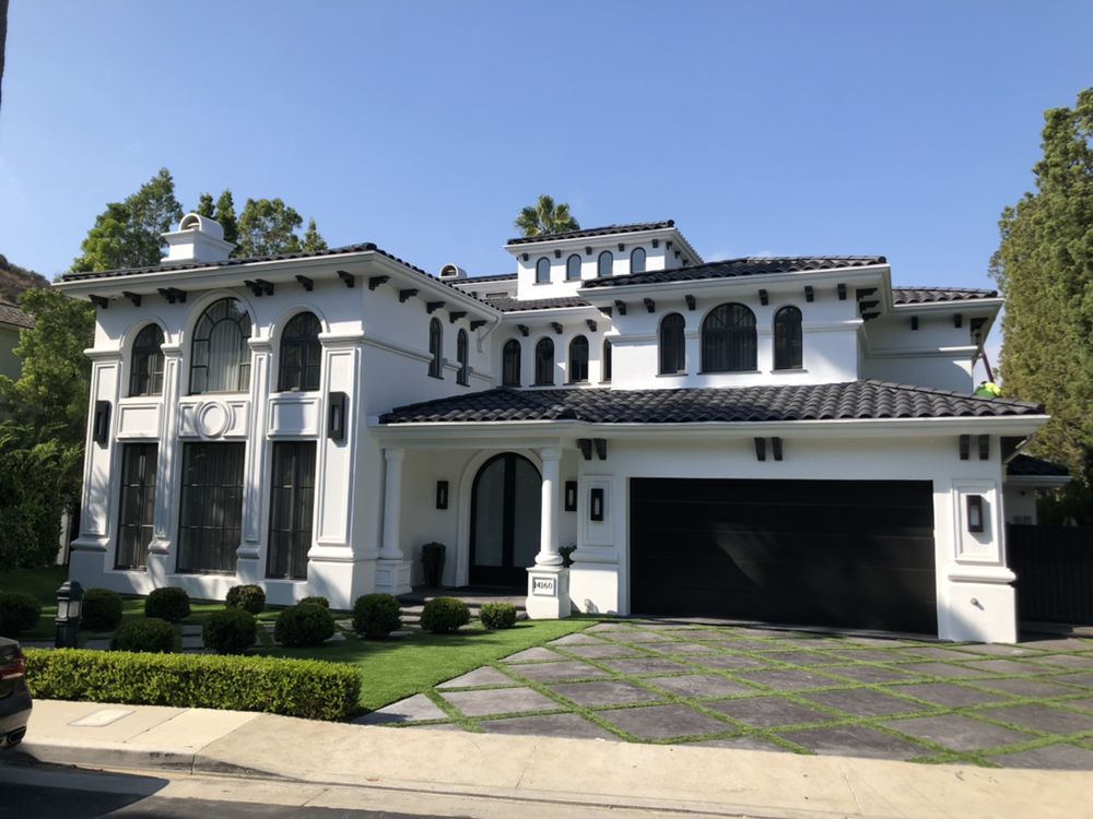 Slide of Reno's Roofing