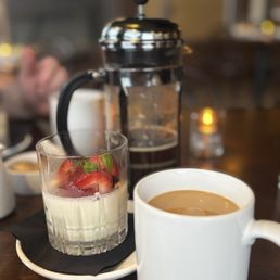 panna cotta - chamomile pudding with strawberries, basil & balsamic syrup