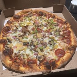 Argentos Pizza - Pizza was mid at best. I don't like chewy pizza crust 2.5 out of five.