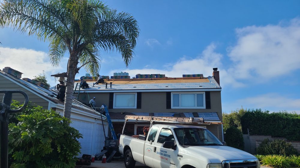 Slide of Tom Byer Roofing Service