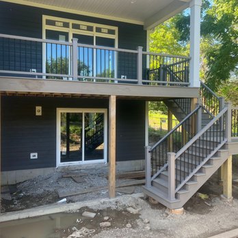 Master Craft Deck Builders - a view of a deck and stairs - Decks & Railing Near Me