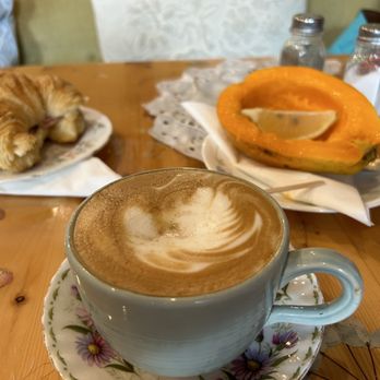 Tea-licious Cafe - My breakfast: latte, 1/2 papaya, ham & cheese croissant. - Coffee & Tea Near Me - Kailua-Kona, Hawaii Tea-licious Cafe - My breakfast: latte, 1/2 papaya, ham & cheese croissant. - Coffee & Tea Near Me - Kailua-Kona, Hawaii
