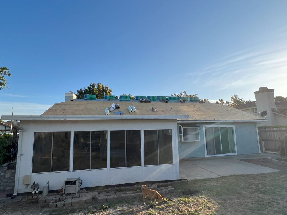 Slide of El Puma Roofing