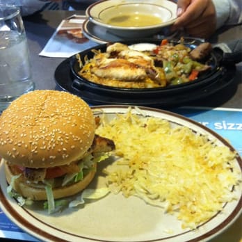 Denny's - My chicken sandwich, and my boyfriend's not-so-sizzling plate, which arrived shortly after his soup appetizer. - Diners Near Me - Gustine, California Denny's - My chicken sandwich, and my boyfriend's not-so-sizzling plate, which arrived shortly after his soup appetizer. - Diners Near Me - Gustine, California