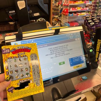 7-Eleven - a person holding a card and a cash machine - Convenience Stores Near Me - San Diego, California 7-Eleven - a person holding a card and a cash machine - Convenience Stores Near Me - San Diego, California