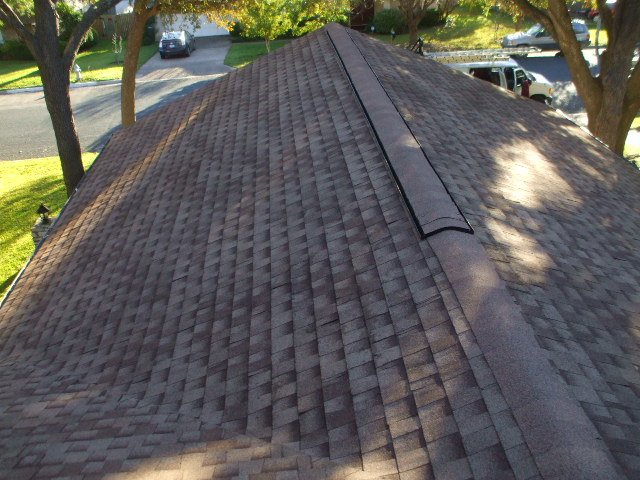 Slide of Ruddy's Roofing