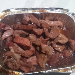 Roman Dial A Pizza - Daughter wanted boneless ribs. This is what sge got for $17.95. Ewwww wtf is that.  Pizzas were ok but this made us all feel ill