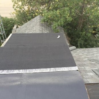 Progo Renovation - a flat roof being installed - Roofing Near Me - Calgary, Alberta Progo Renovation - a flat roof being installed - Roofing Near Me - Calgary, Alberta