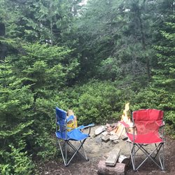 Quietside Campground and Cabins - Fire pit with bench/table provided.