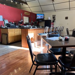 Stone House Cafe - Bar and table seating.
