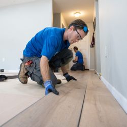 West Shore Home - West Shore Home's highly trained employee installers working on installing full house flooring.