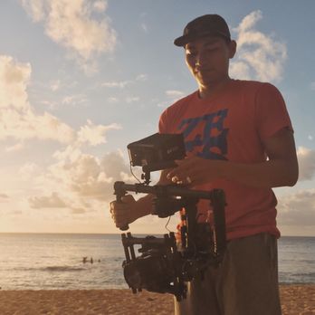 Motion & Story - Neil of Motion & Story and some of his favorite pieces of gear to tell stories. During sunset on the North Shore of Oahu, Hawaii. - Photo Booth Rentals Near Me Motion & Story - Neil of Motion & Story and some of his favorite pieces of gear to tell stories. During sunset on the North Shore of Oahu, Hawaii. - Photo Booth Rentals Near Me