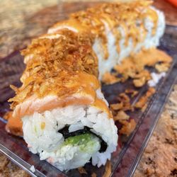 Roll It Sushi & Teriyaki - Seared Salmon Roll (TikTok: @justandyvu)