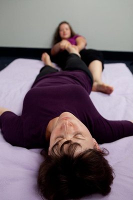 Thai Massage - A full Thai massage session typically lasts 90 minutes to two hours or more and includes rhythmic pressing and stretching of the entire body. This may include pulling fingers, toes, ears, cracking knuckles, walking on the recipient's back, and moving the recipient's body into many different positions. There is a standard procedure and rhythm to the massage, which the giver will adjust to fit the receiver.