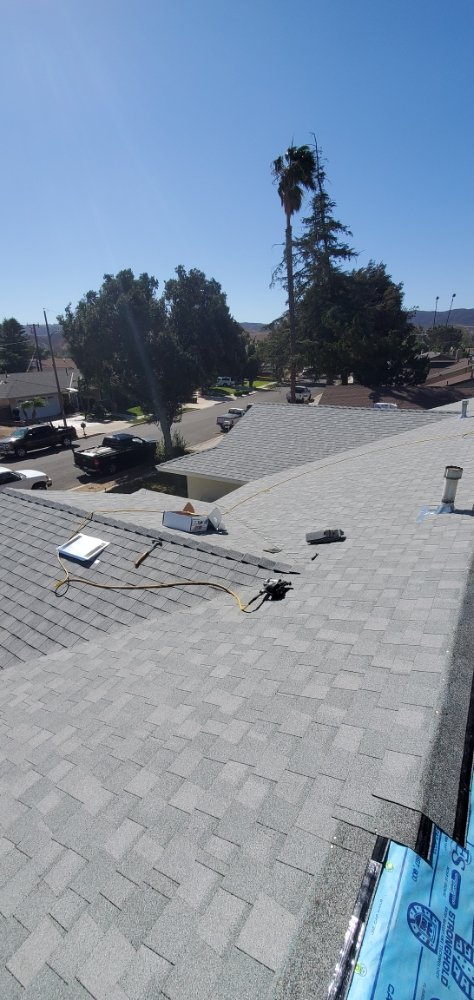 Slide of Three Clovers Roofing