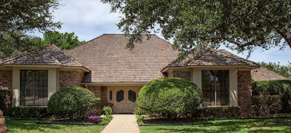Slide of Sitton Roofing