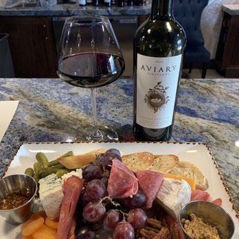 Uncorked On State - Charcuterie board with an excellent bottle of wine - Wine Bars Near Me - Redlands, California Uncorked On State - Charcuterie board with an excellent bottle of wine - Wine Bars Near Me - Redlands, California