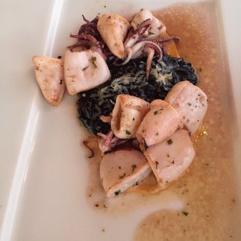Sufi - Grilled squid with black ink risotto. - Mediterranean Near Me - Nayarit, NAY Sufi - Grilled squid with black ink risotto. - Mediterranean Near Me - Nayarit, NAY