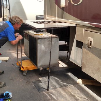 Dakota RV - Our "basement" A/C unit must be removed and replaced, in order to perform needed repairs. Kevin knows these a/c units very well. - RV Dealers Near Me - Rapid City, South Dakota Dakota RV - Our "basement" A/C unit must be removed and replaced, in order to perform needed repairs. Kevin knows these a/c units very well. - RV Dealers Near Me - Rapid City, South Dakota