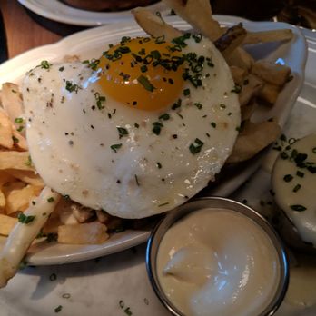 Au Cheval - Fries with an egg, garlic aioli, and mornay sauce (cheese sauce). Yum! - Bars Near Me - Chicago, Illinois Au Cheval - Fries with an egg, garlic aioli, and mornay sauce (cheese sauce). Yum! - Bars Near Me - Chicago, Illinois