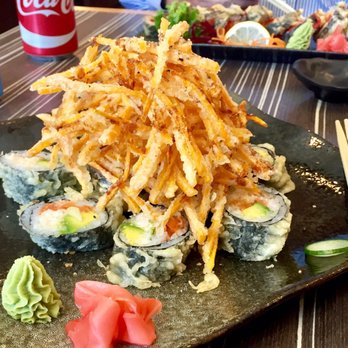 Ken Sushi - MT. Fiji Roll.... Yam tempura on top of mayo crab, salmon and avocado roll (deep fried).  Looks awesome, but 3 star for taste and quality - Sushi Bars Near Me - Waterloo, Ontario