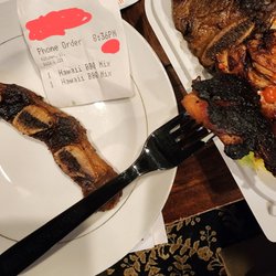 Ono Hawaiian BBQ - Name of who helped me omitted as well as my order name for anonymity. But you can see how charred the chicken is same for spare ribs.