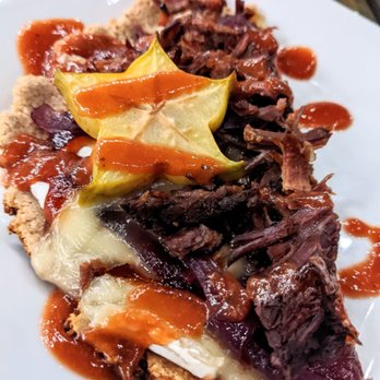 Do Good Farm - Fresh ground whole grain flatbread with brisket and housemade farm raised guava barbecue sauce with star fruit - Farms Near Me - Winter Garden, Florida