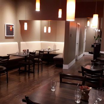 Indique-Nolan Hill - a restaurant with tables and chairs - Indian Near Me - Calgary, Alberta Indique-Nolan Hill - a restaurant with tables and chairs - Indian Near Me - Calgary, Alberta