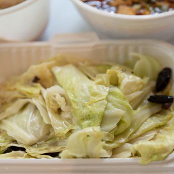 New Chongqing Restaurant - a bowl of cabbage and a bowl of black olives - Chinese Near Me - Vancouver, British Columbia New Chongqing Restaurant - a bowl of cabbage and a bowl of black olives - Chinese Near Me - Vancouver, British Columbia