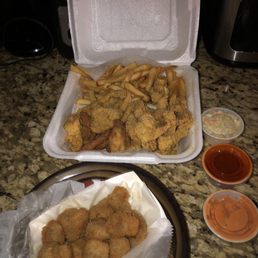 Lunch special: Catfish bites and shrimp with fries. And a order of fried mushrooms. Lunch special: Catfish bites and shrimp with fries. And a order of fried mushrooms.