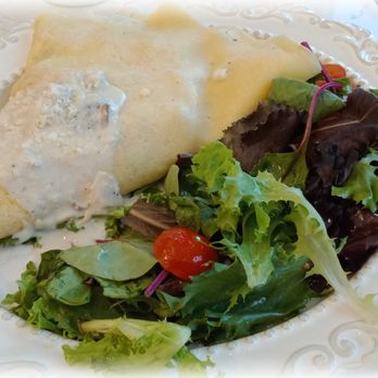 Roses and Berries Cafe - Mushroom, chicken, and mozzarella crepe with bechamel sauce, and side salad. - Breakfast & Brunch Near Me - Dubuque, Iowa Roses and Berries Cafe - Mushroom, chicken, and mozzarella crepe with bechamel sauce, and side salad. - Breakfast & Brunch Near Me - Dubuque, Iowa
