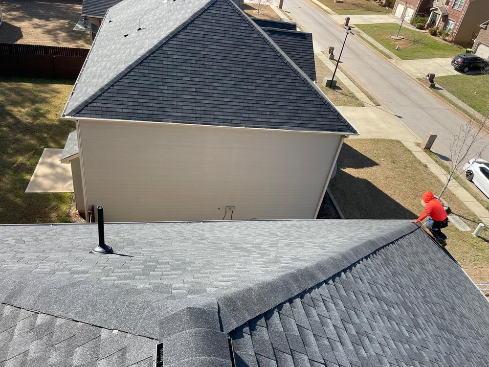 Slide of Umana Roofing