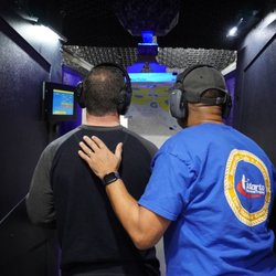Atlanta Firearms Training - Instructor coaching a firearms student one-to-one